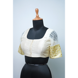 "Graceful Ivory Stonework Blouse with Heart-Cut Back"