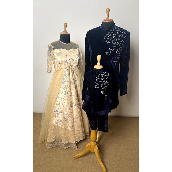 Family outfit set with navy velvet kurta for men and boys, and beige embroidered gown for women