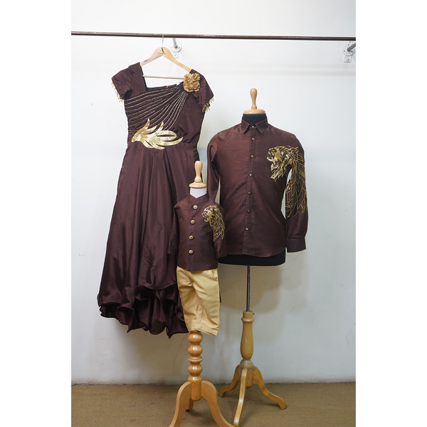 Royal brown and gold matching family outfit set with embroidered gown for mom, shirt for dad, and kurta set for boy.