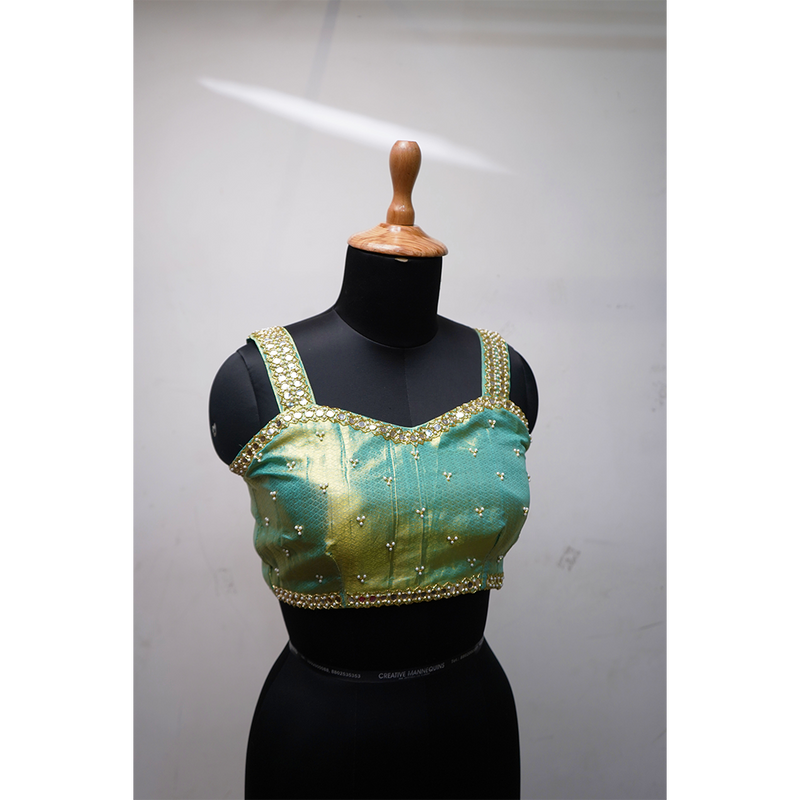 Elegant Aqua-Green Kanchipuram Silk Saree with Contrast Pallu & Embellished Blouse