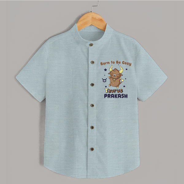 Born To Be Cozy Taurus Shirt | Personalized Shirt for Your Cozy Taurus Baby - ARCTIC BLUE - 0 - 6 Months Old (Chest 23")