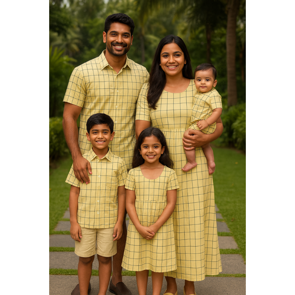 Indian family in coordinated yellow grid check cotton outfits – mom, dad, son, daughter, and baby in casual summer matching clothing