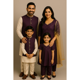 Family wearing coordinated royal plum and ivory raw silk ethnic outfits — father, mother, son, and daughter in traditional Indian attire.