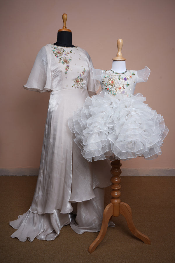 White Chinon and Glitter Organza with Special Embroidery work in Mom and Daughter Combo