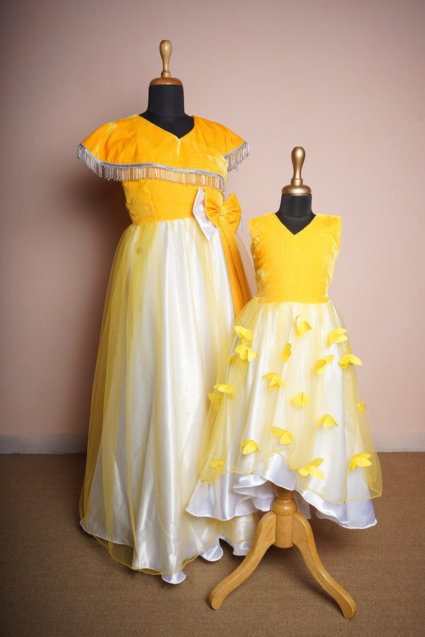 Yellow Velvet and Plain Net With Special Butterfly Work in Mom and Daughter Combo