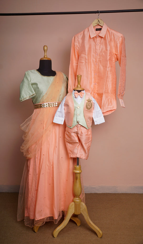 Light Orange and Light Green Rawsilk and Pearl net with Special Embroidery work and Gold Stone Belt Family Clothing