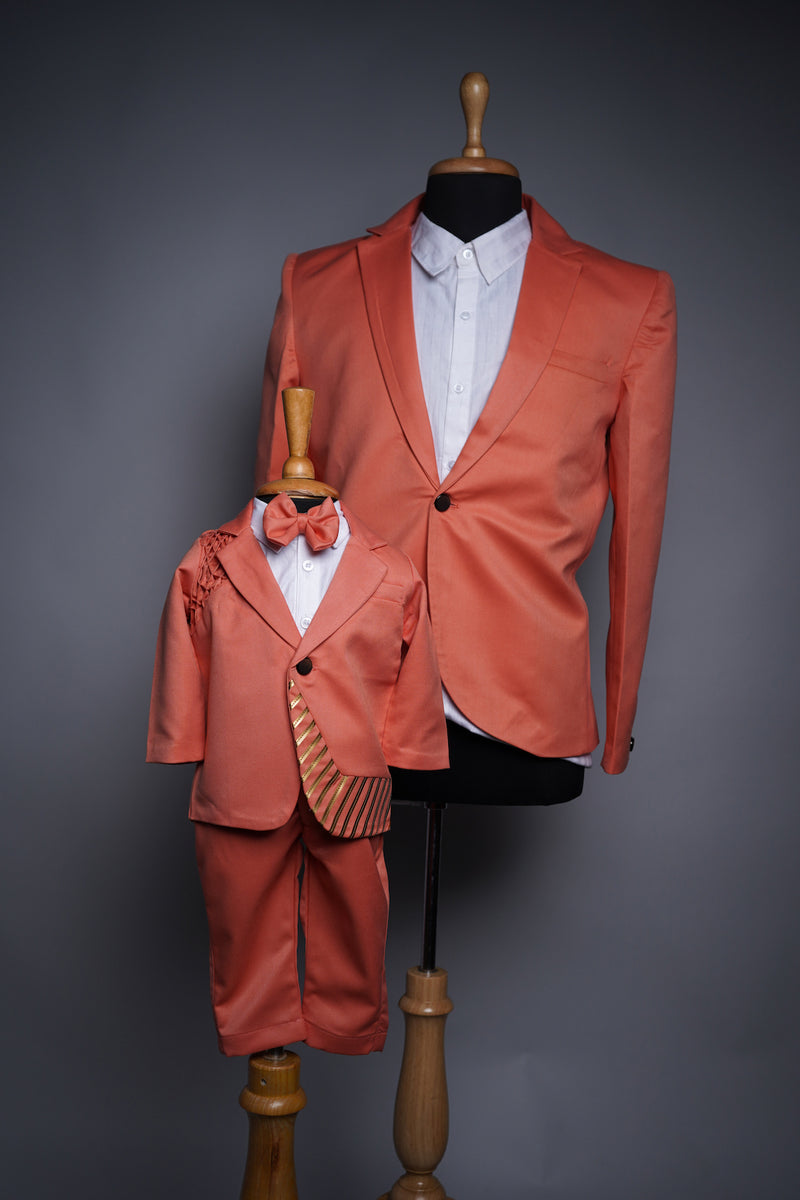 Orange suiting fabric with special smocking work and Gold metal Stripes work and White Cotton Shirt  Dad and Son Combo