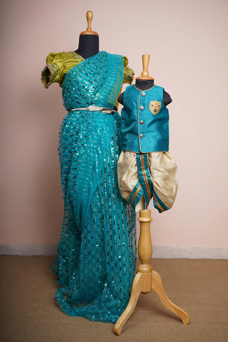 Peacock Blue Rawsilk and Sequin Embroidery net with Special Aari work and Special Lion Embroidery work in Mom and Son Combo