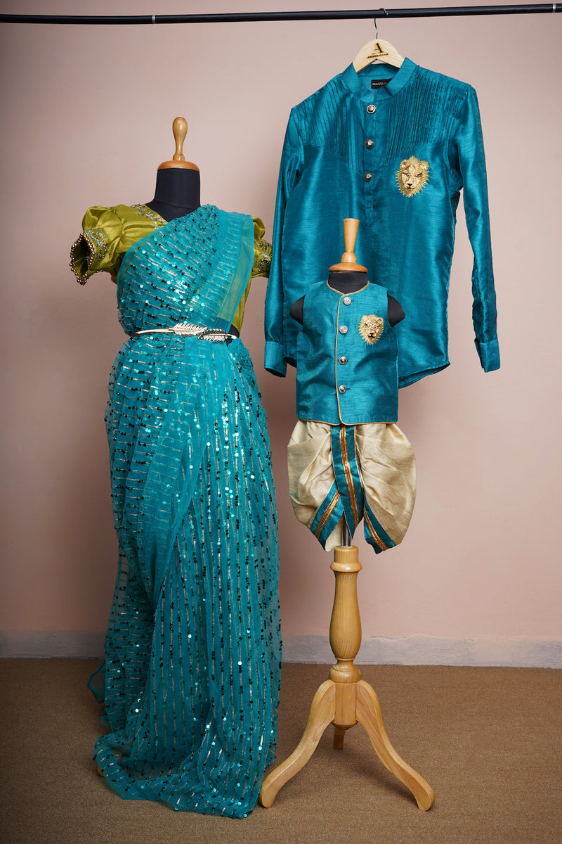 Peacock Blue and Gold Rawsilk and Sequin Embroidery net with Special Aari work and Special Lion Embroidery work in Family Clothing