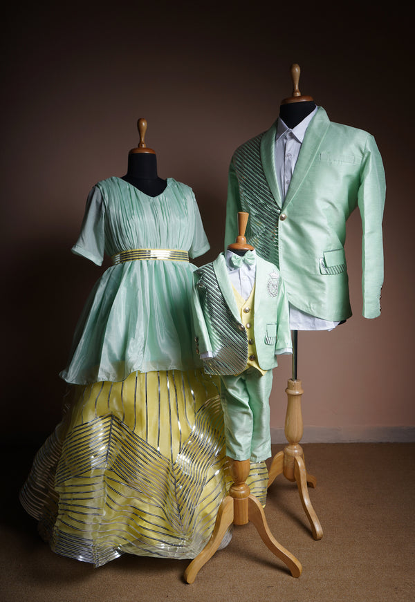 Aqua Green Rawsilk and Chinon and Yellow Organza with Metal Stripes Work in Family Clothing