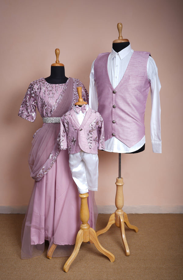 Lilac Fancy Embroidery net and Rawsilk and White Satin and Special Stone work Family Clothing