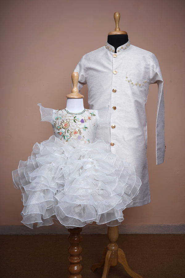 White Rawsilk and Glitter Organza with Special Embroidery work in Dad and Daughter Combo
