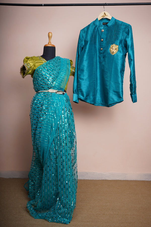 Peacock Blue Rawsilk and Sequin Embroidery net with Special Aari work and Special Lion Embroidery work in Couple Clothing
