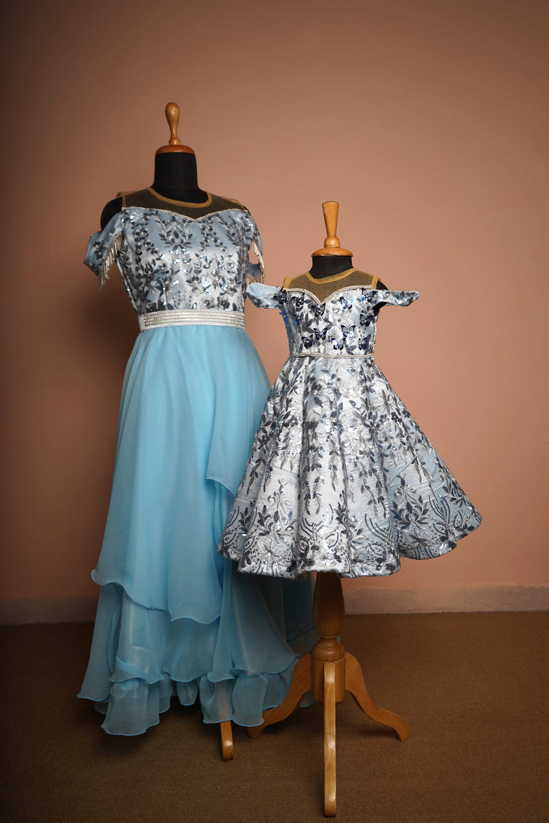 Sky Blue Fancy Embroidery net and Plain Georgette with Special Stone belt in Mom and Daughter Combo