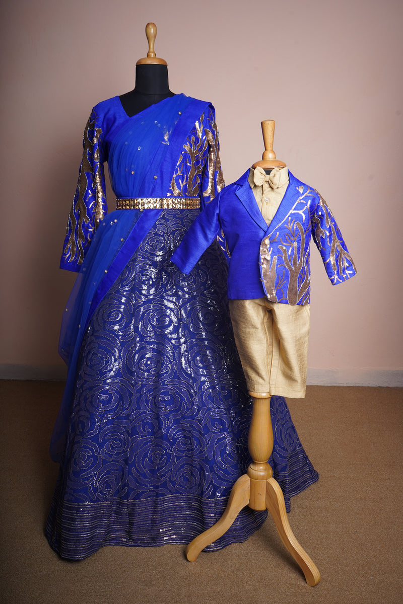 Cobalt Blue and Gold Rawsilk and Kali Fabric with Special Embroidery work and Gold stone Belt in Mom and Son Combo