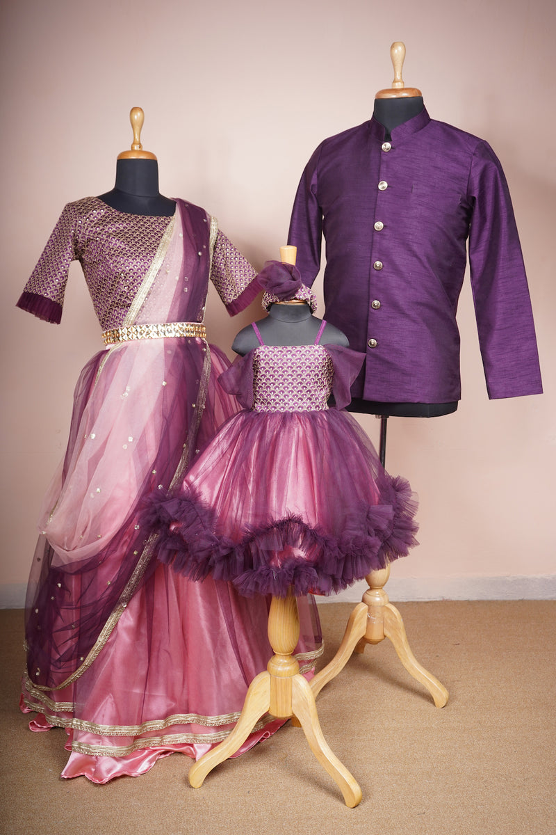 Dark Purple Rawsilk and Embroidered Grand Fabric and plain net with Speacial Embroidery work in Family Clothing